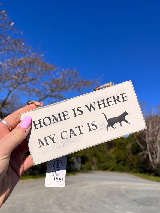 HOME is here the cat is sign
